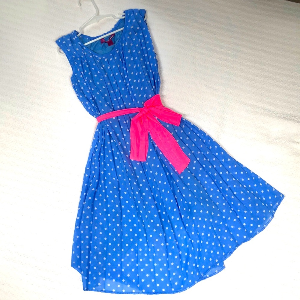 Perry winkle, polkadotted dress with bright pink tie